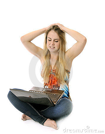 Pretty Youjg Woman Frustrated With Her Computer On White Background