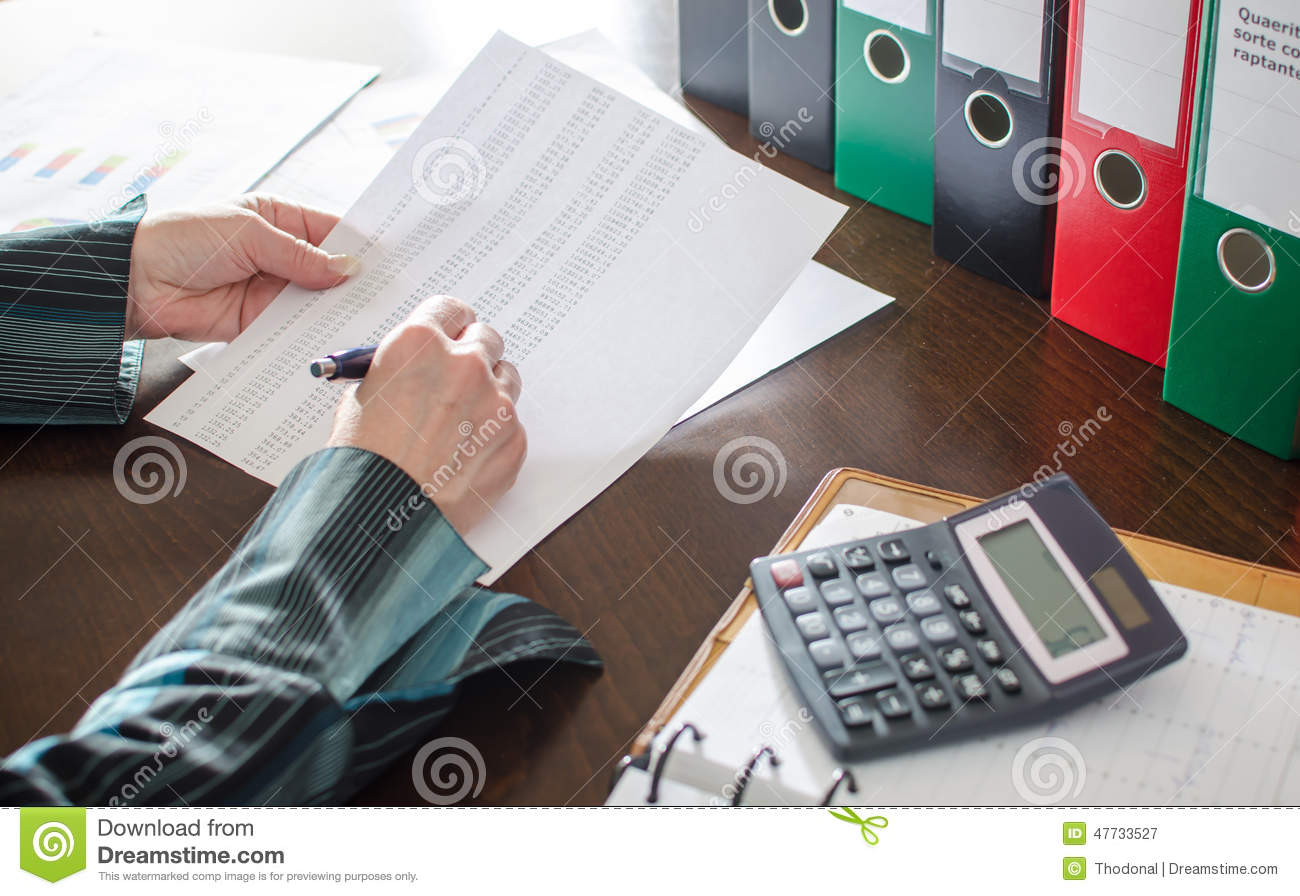 Female Accountant Checking Financial Documents Stock Photo   Image