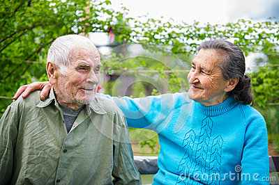 Cute 80 Plus Year Old Married Couple Posing For A Portrait In Their