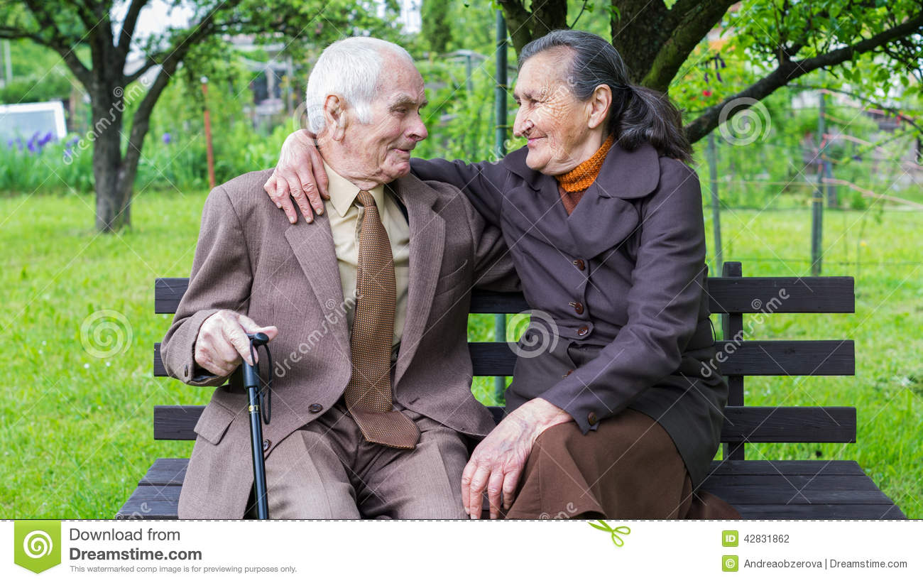 Cute 80 Plus Year Old Married Couple Posing For A Portrait In Their    