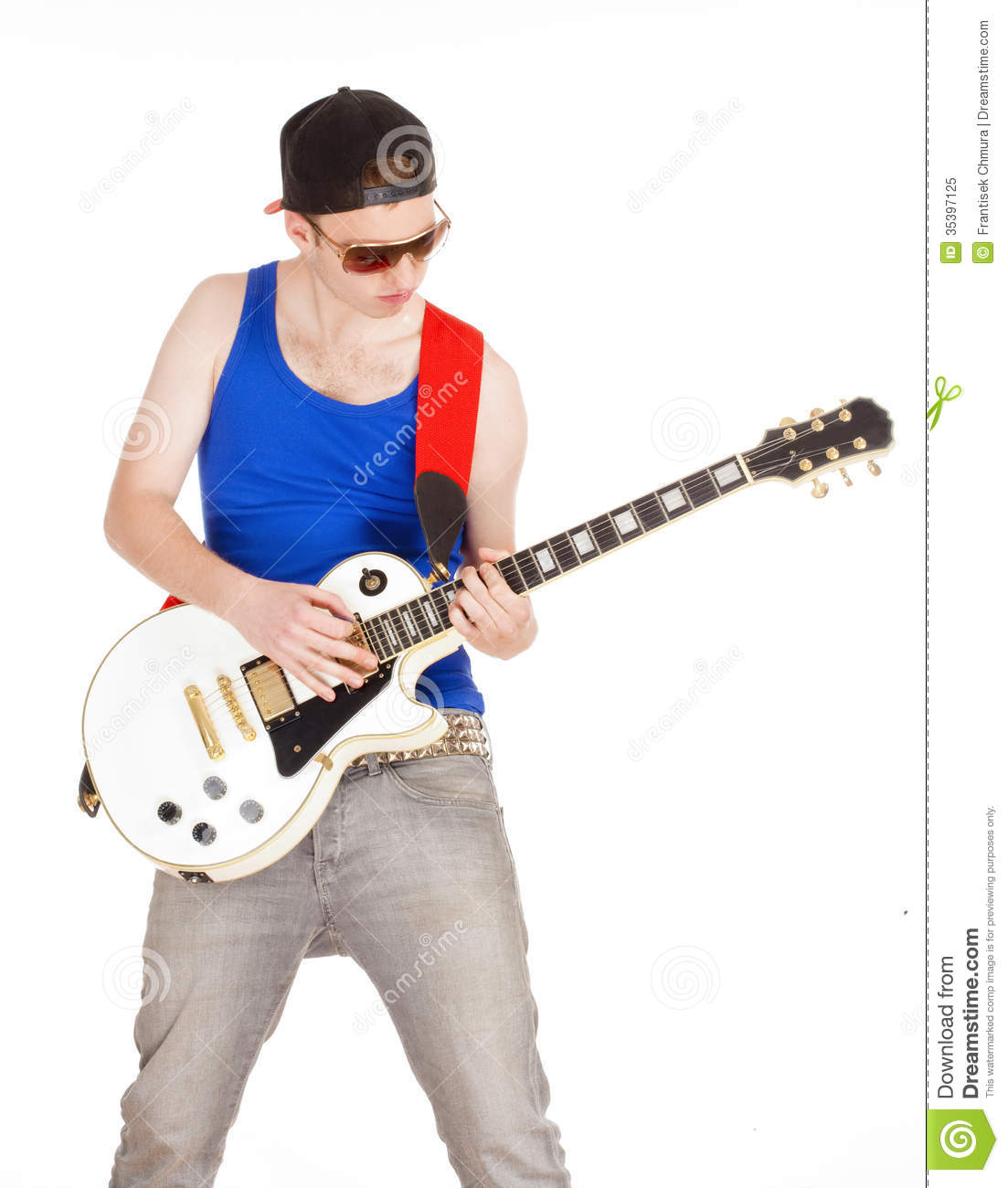 Teenage Boy With Sunglasses Playing Electric Guitar Royalty Free Stock