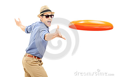Young Man Throwing A Frisbee Disk Stock Photo   Image  40000265