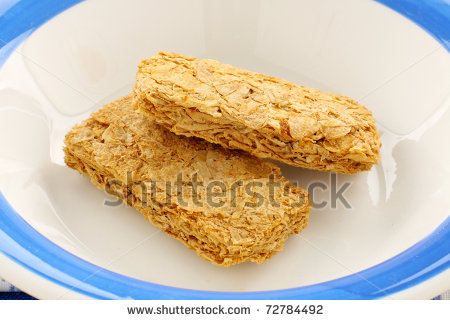     Australian Breakfast Cereal Weet Bix Served In A Bowl    Stock Photo