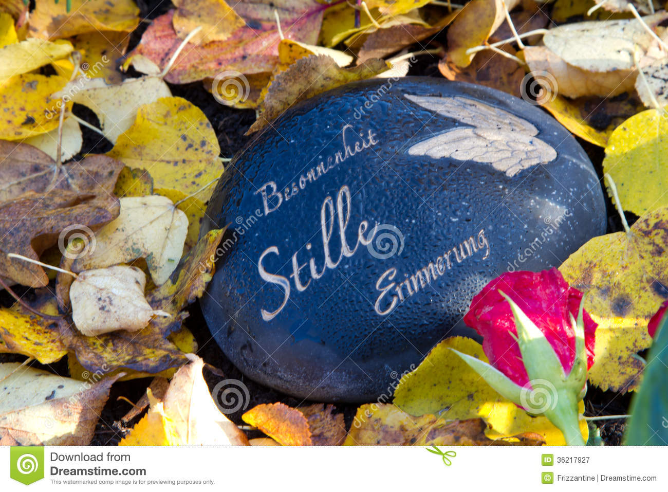 Black Grave Stone In Autumn With German Words Royalty Free Stock