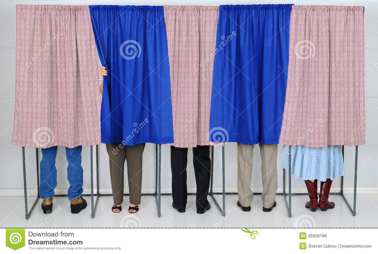 Row Of Five Voting Booths With Men And Women Casting Their Ballots    
