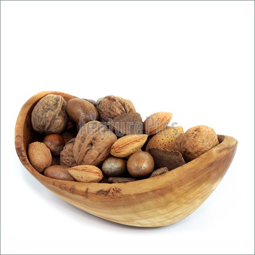 Photo Of Nut Selection In An Olive Wood Bowl Of Brazil Walnuts