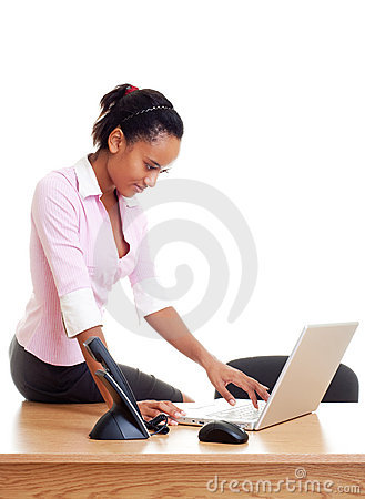 Student Sitting On The Table And Typing Stock Image   Image  14021101