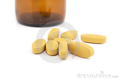 Vitamin C Pills With Medicine Bottle Background Royalty Free Stock