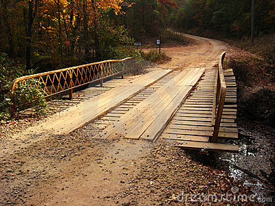 Plank Bridge On A Dirt Road Deep In The Woods Of Georgia 