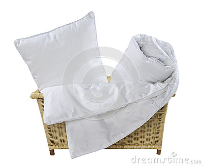     Of   Basket With Pillow And Blanket Isolated On White Background