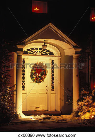 1970s Front Door House Entrance In Winter Snow Decorated For Christmas