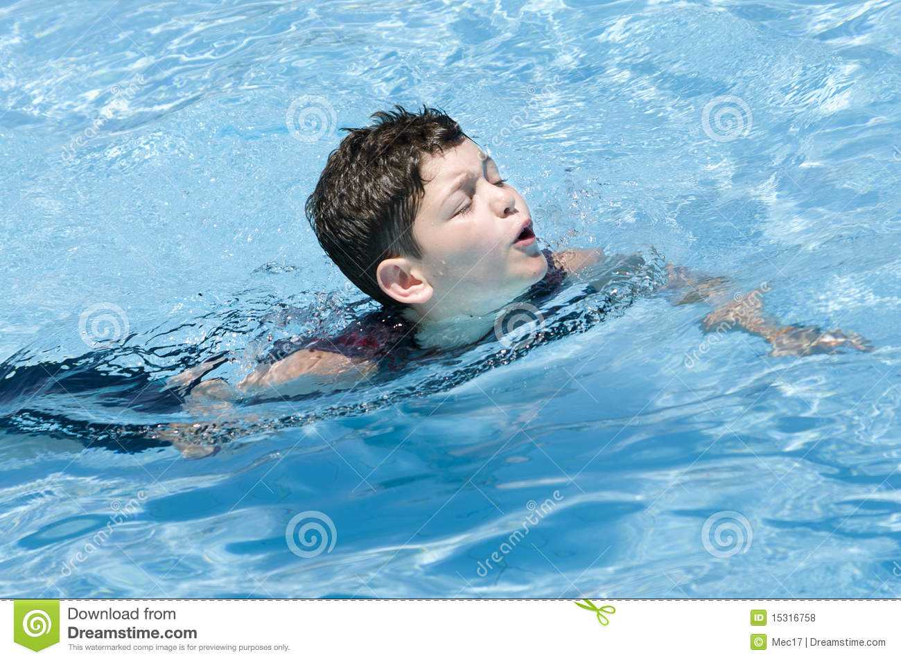 Young Boy Swimming And Having Fun In Swimming Pool Royalty Free Stock    