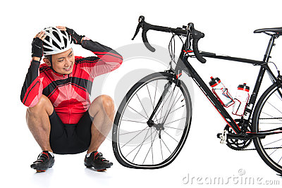     And Looking At His Flat Tire Bike Isolated On White Background
