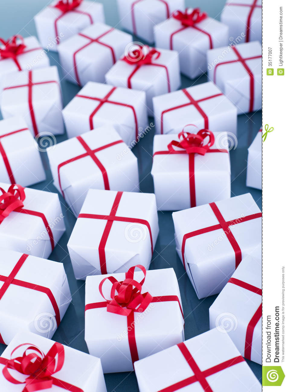 Lots Of Christmas Presents On Reflective Surface Royalty Free Stock    