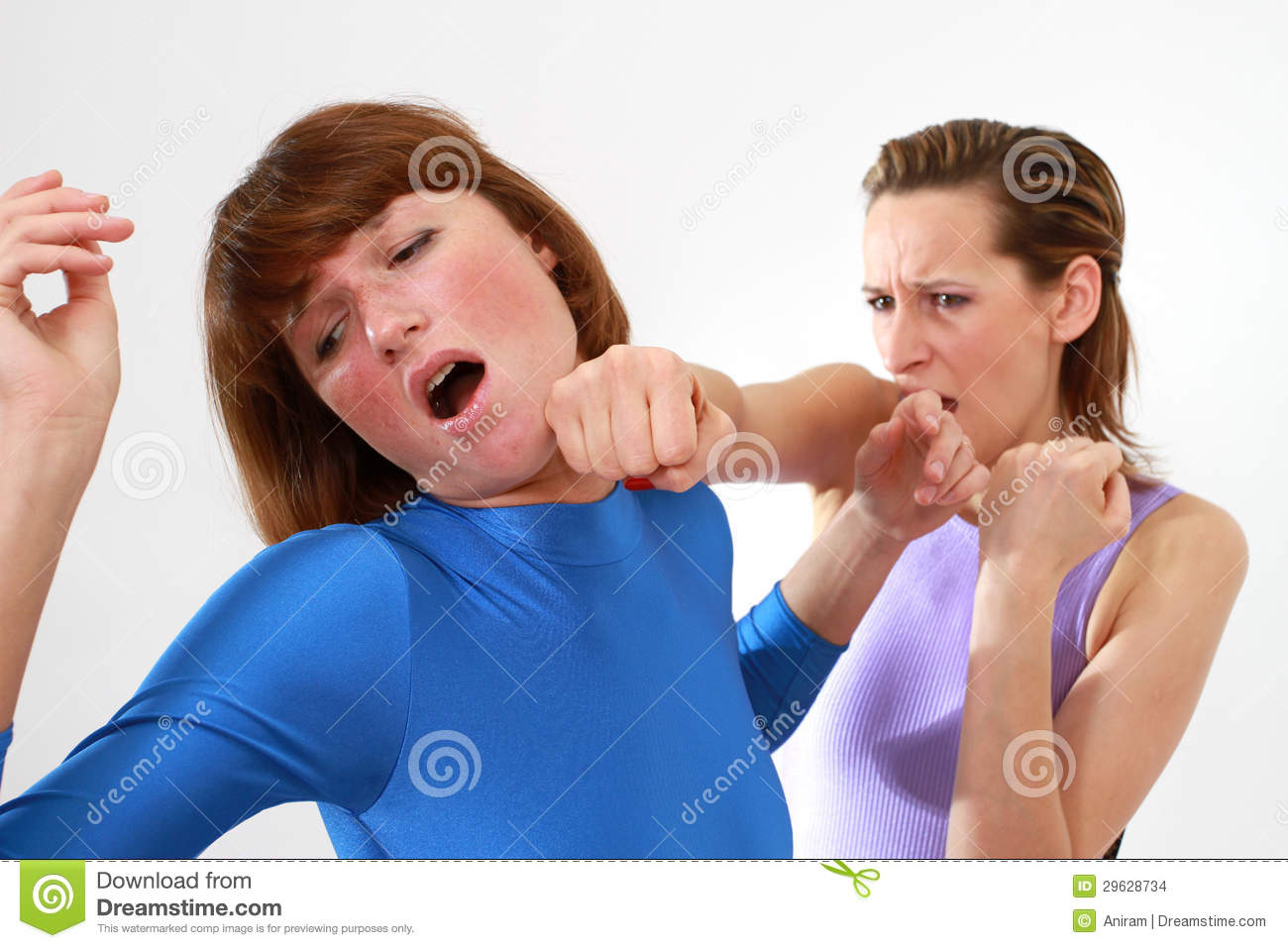 Women Fighting   Face Punch Over White Background 