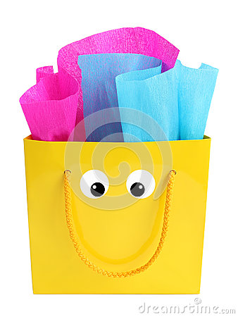 Yellow Gift Bag Stuffed With Pink And Turquoise Tissue Paper With A