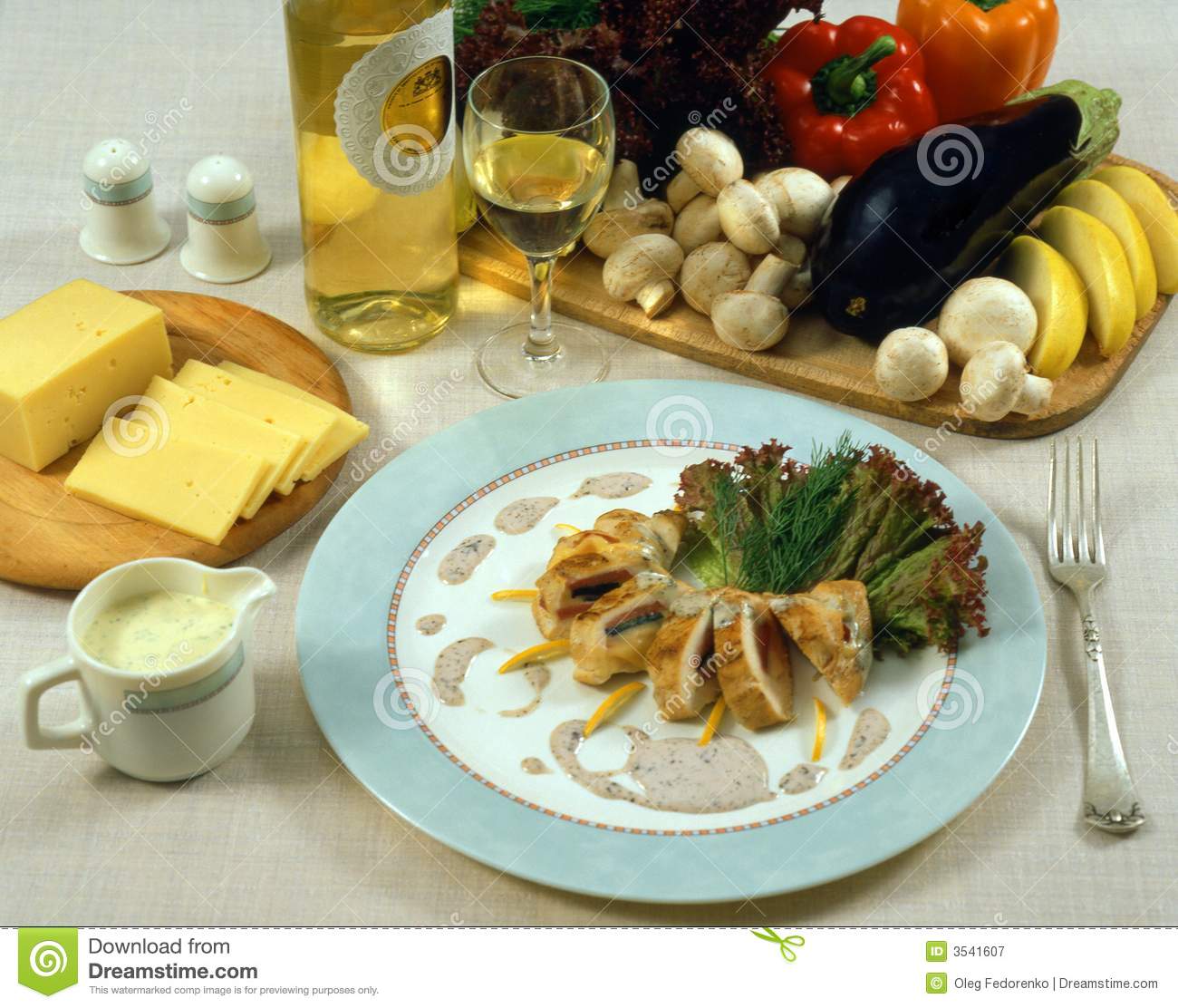 Elegant Dinner With Main Course Vegetables Cheese And White Wine