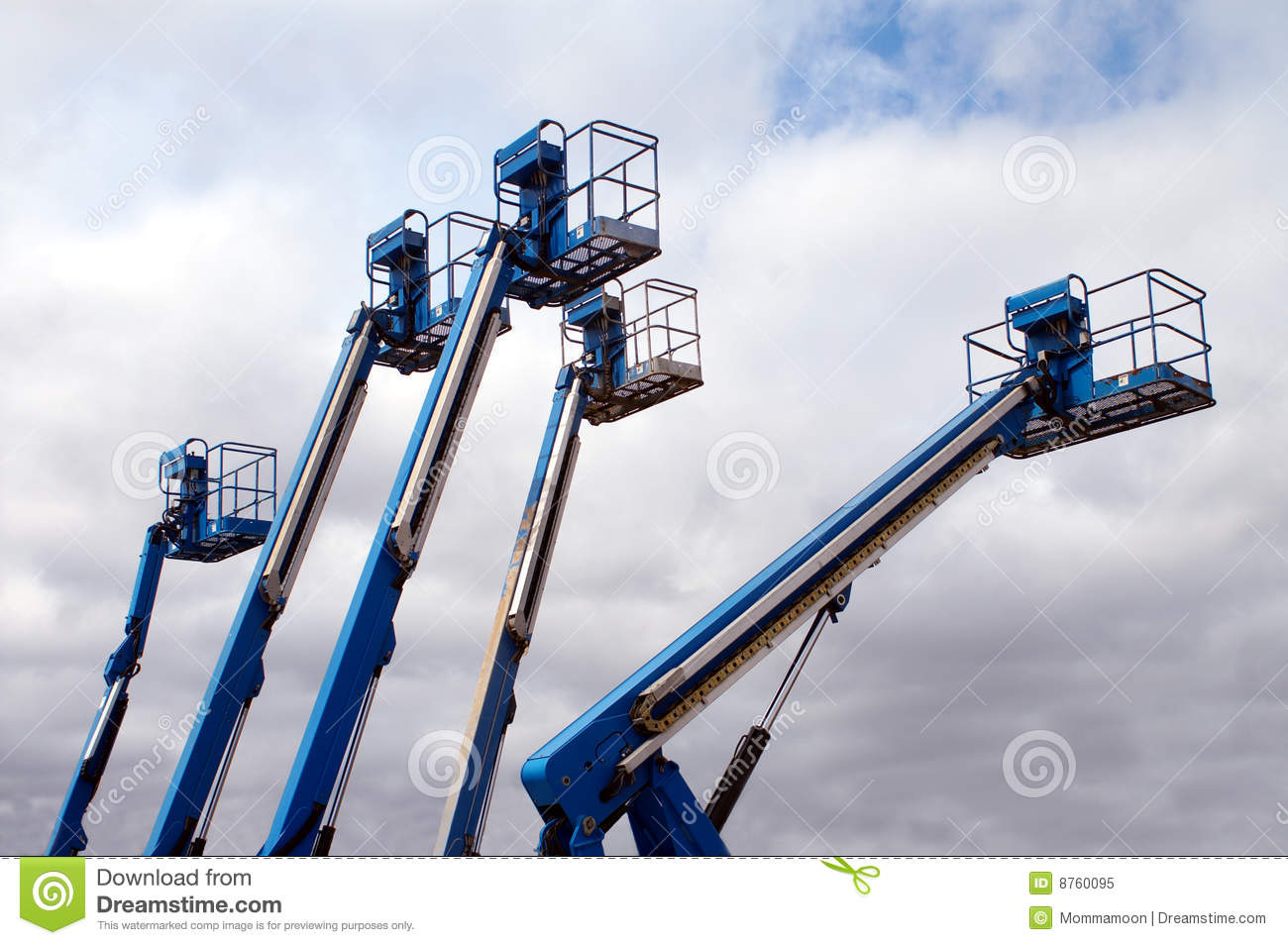 Group Of Colorful Aerial Lifts Reaching Up Into The Sky