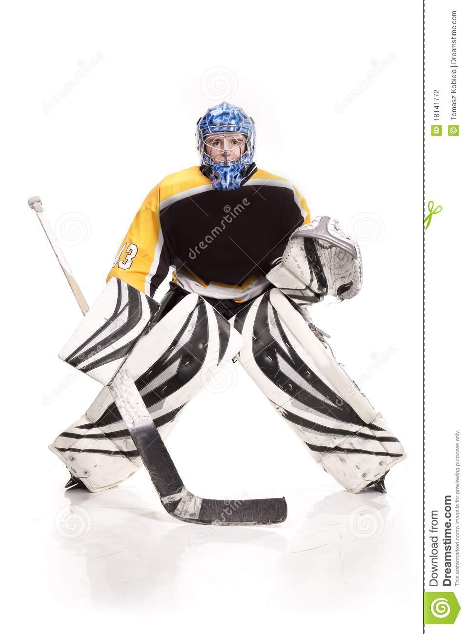 Ice Hockey Goalie Blocking A Puck With Stick  Photo On White    
