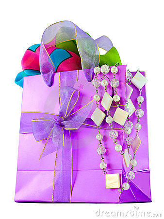 Glossy Pink Gift Bag With Silk Scarf And Pearl Necklace Isolated On