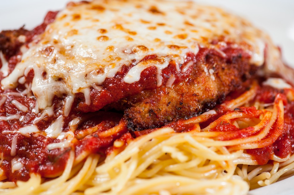 Chicken Parmesan Parmesan Crusted Chicken Breast Served Over Spaghetti