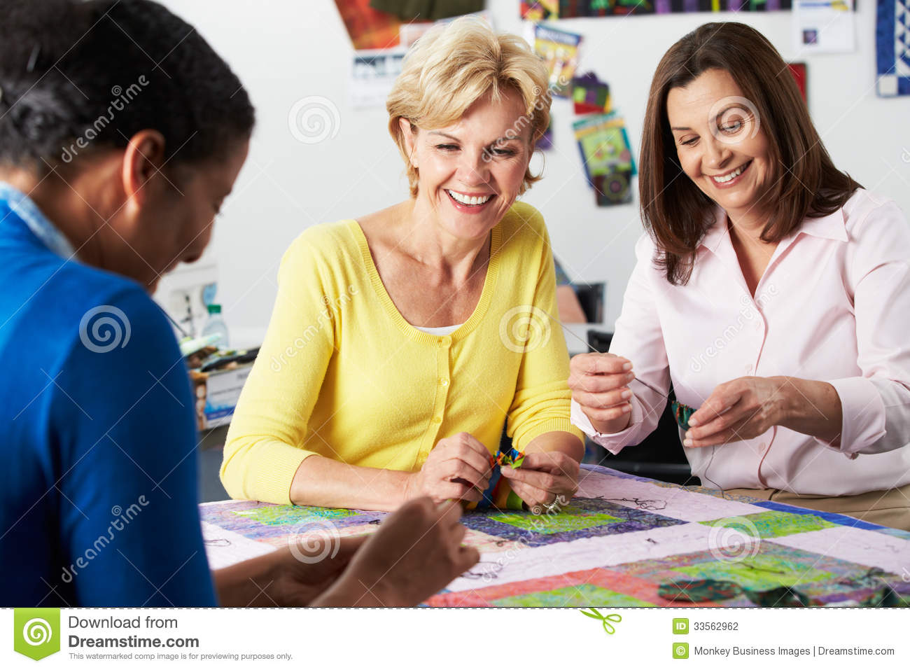 Group Of Women Making Quilt Together Stock Photography   Image