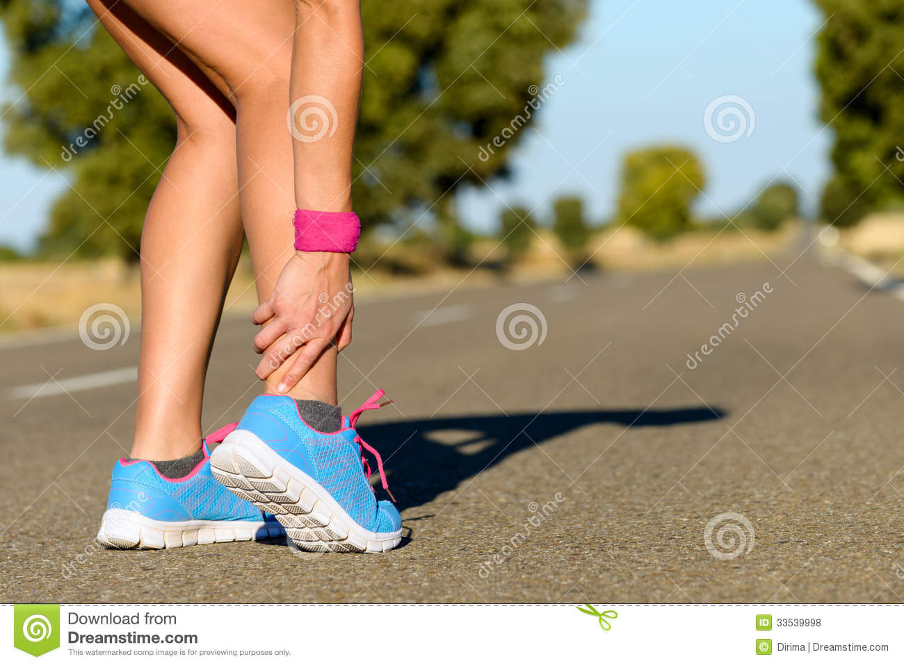 Ankle Sprain  Sportswoman Touching Painful Twisted Or Broken Ankle