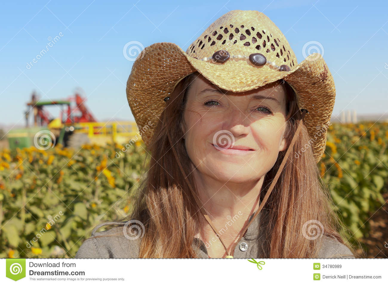 Lady Farmer In A Sunflower Field Royalty Free Stock Images   Image