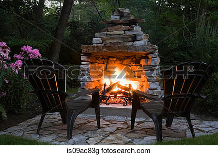 Stock Photo   Two Chairs In Front Of Outdoor Fireplace  Fotosearch