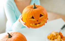 Close Up Of Woman With Pumpkins At Home Stock Photo