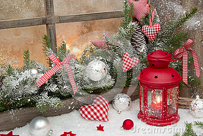 Red Rustic Christmas Decoration On Window Sill With Red Checked Hearts