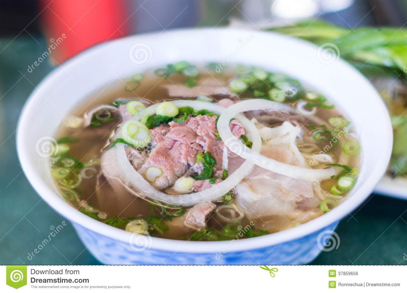 Bowl Of Vietnamese Pho Noodle Soup With Rare Beef Tendon Tripe And