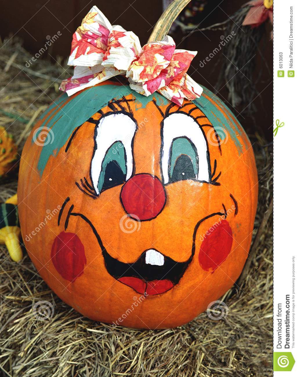 Stock Photos  Happy Face Painted Pumpkin