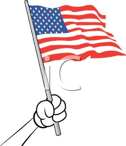 Hand Holding A Small American Flag   Royalty Free Clipart Picture