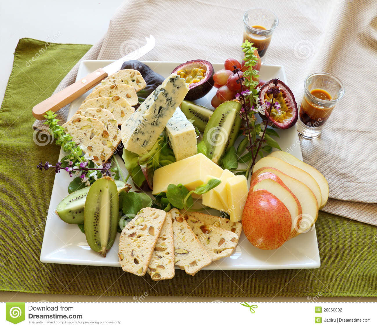 Delicious Fruit And Cheese Platter Featuring A Variety Of Different
