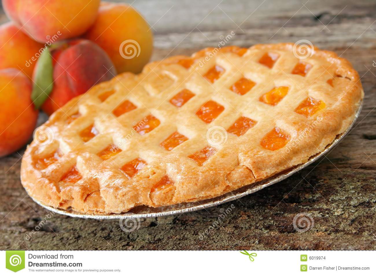 Fresh Baked Peach Pie With Fresh Peaches In The Background  Used A