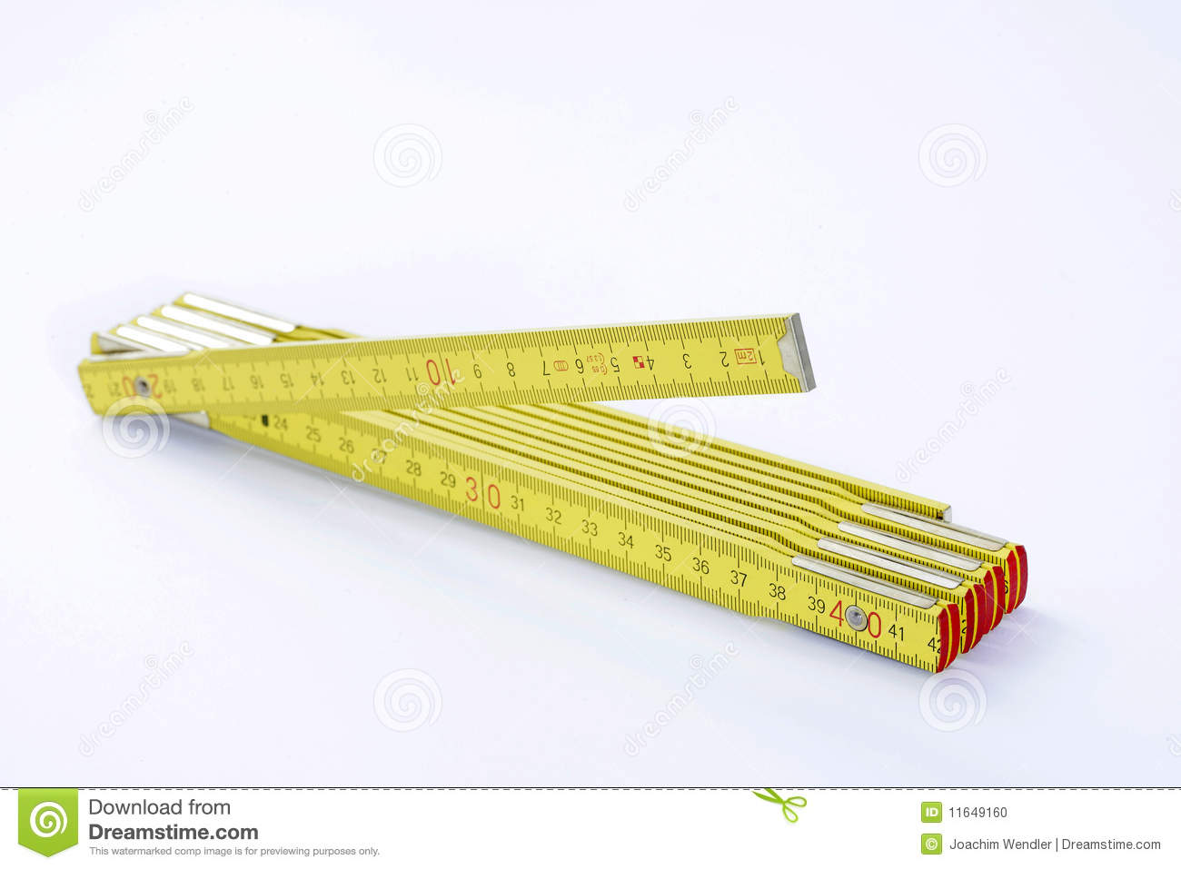 Yellow Folding Measuring Stick Is Spread Out On White Background