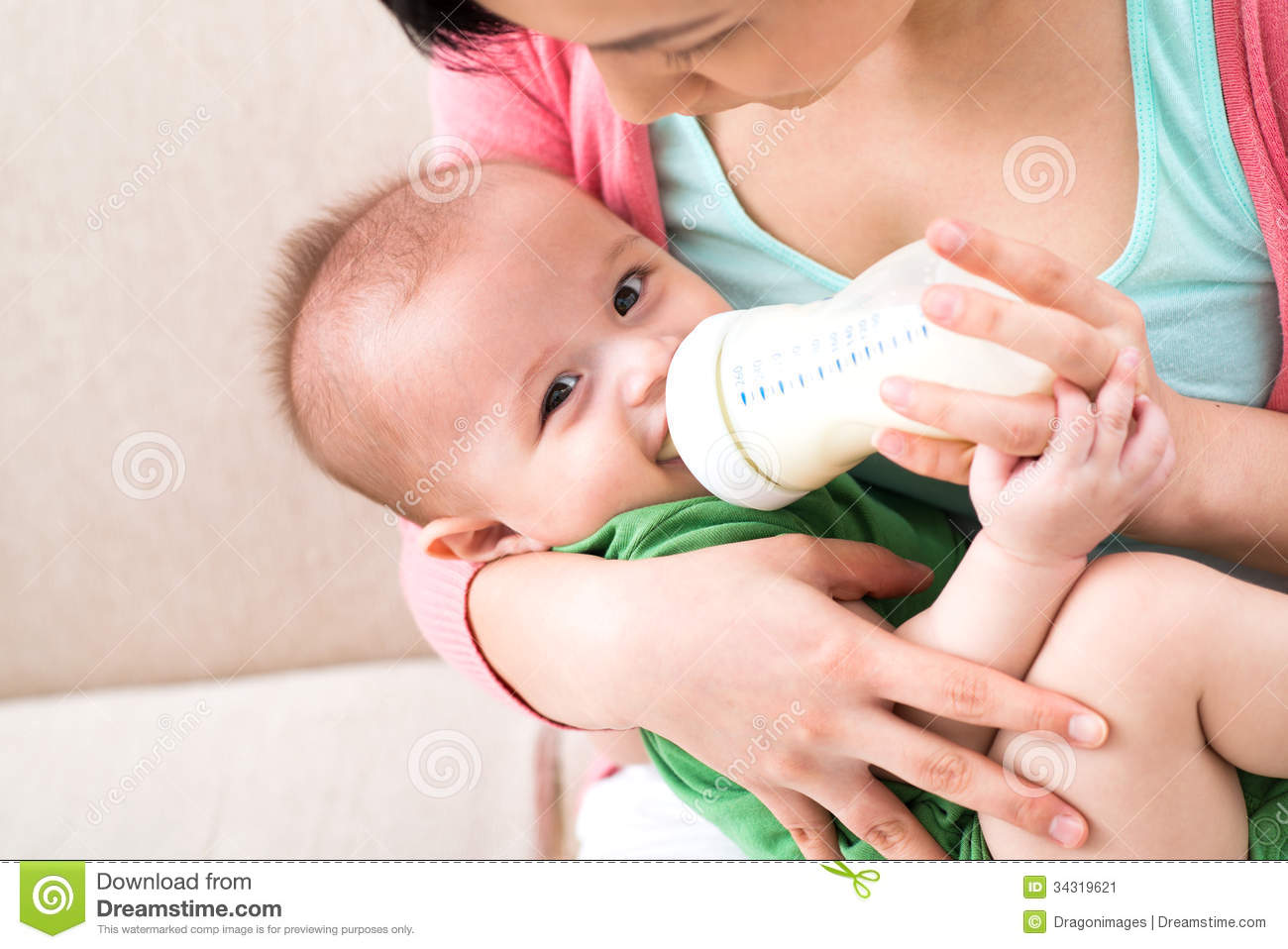 Mother Feeding Milk To Baby Clipart Illustrations Gg59413760