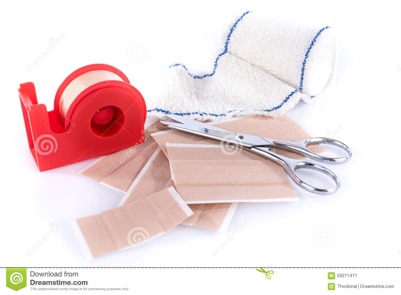 Plasters And Medical Bandage With Scissors Isolated On White
