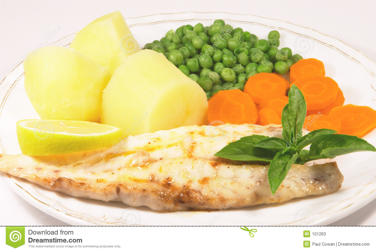 Meal Of Grilled Fish Fillet With Potatoes Peas And Carrots