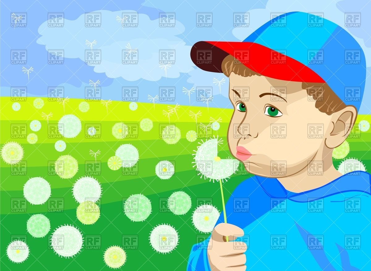 Little Boy In A Blue Cap And Blue Jacket Blowing On A Dandelion On A    