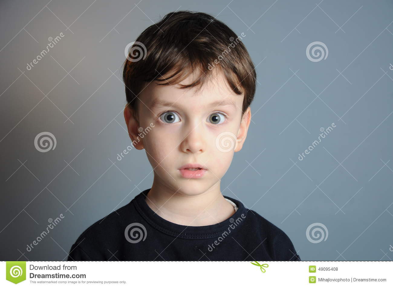Year Old Boy Looking Stunned At Camera