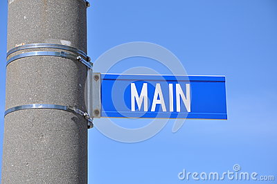 Main Street Sign Posted In The Concrete Pole