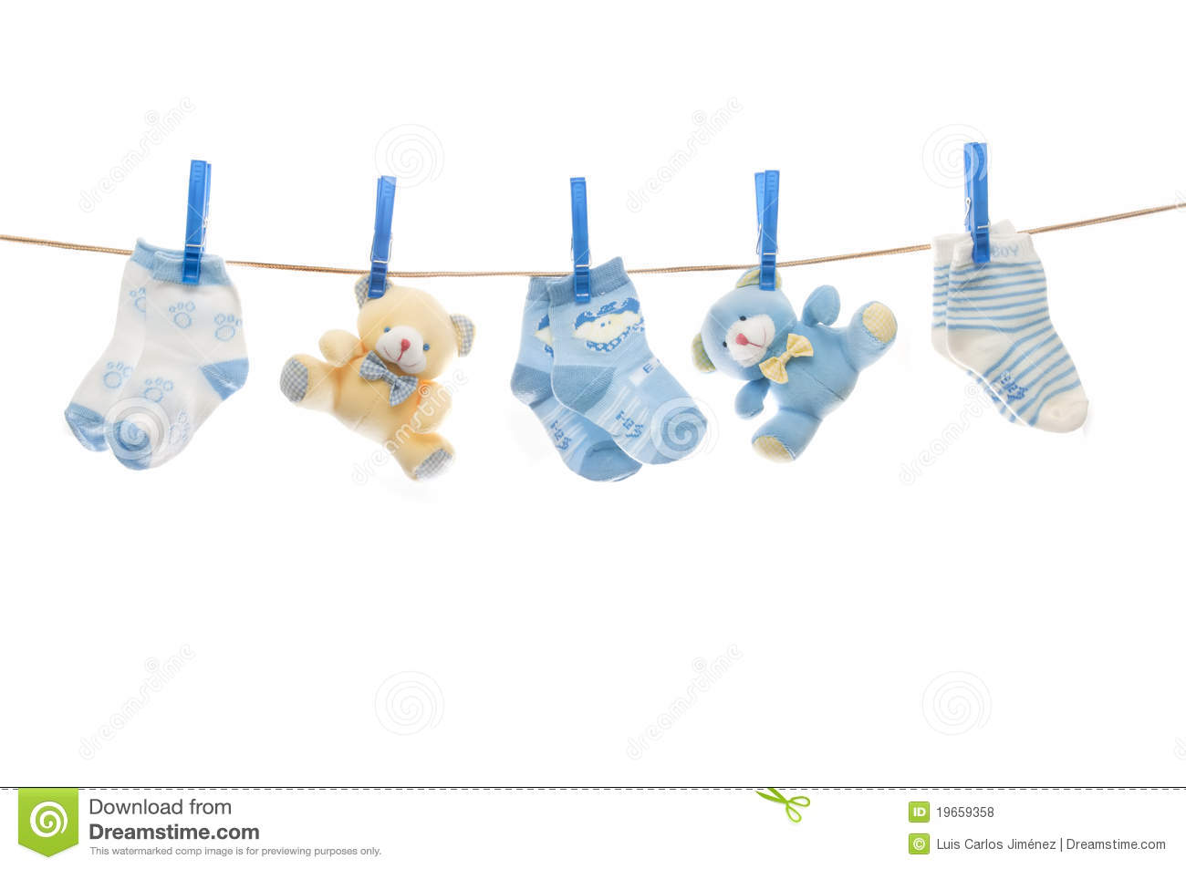 Teddy Bears And Baby Socks Lying On The Rope Isolated On White