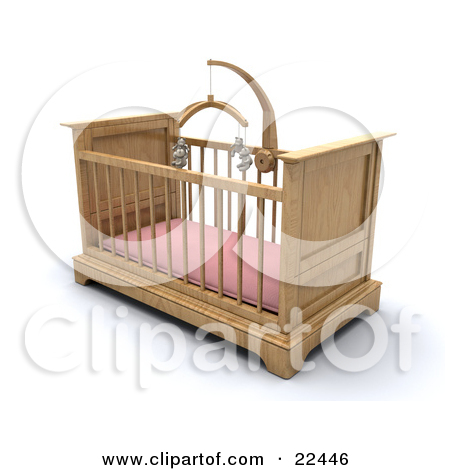 Girls Baby Crib In A Nursery With A Pink Pad And Teddy Bear Mobile