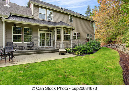 Stock Photo   House Exterior Spacious Backyard With Patio Area   Stock