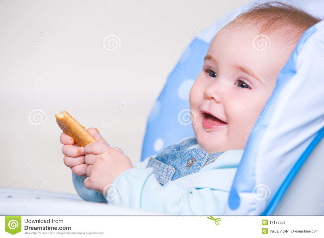 Happy Toddler Eating Cookie Stock Photography   Image  17139652