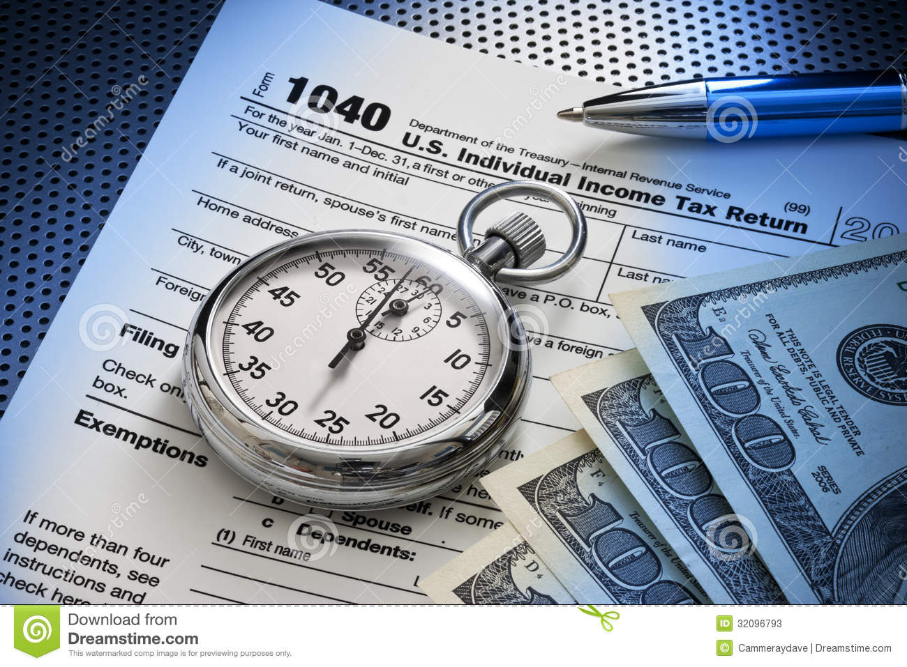 Still Life Of A Us 1040 Tax Form With Stopwatch Money And Pen