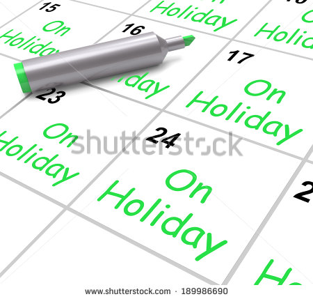 On Holiday Calendar Showing Annual Leave Or Time Off   Stock Photo