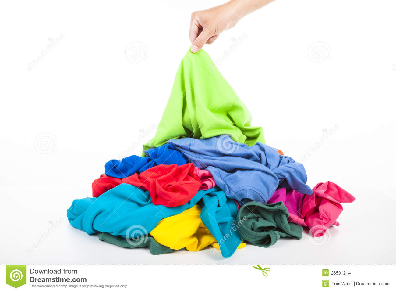 Hand Pick Up Shirt In Pile Of Clothes Stock Images   Image  26591214